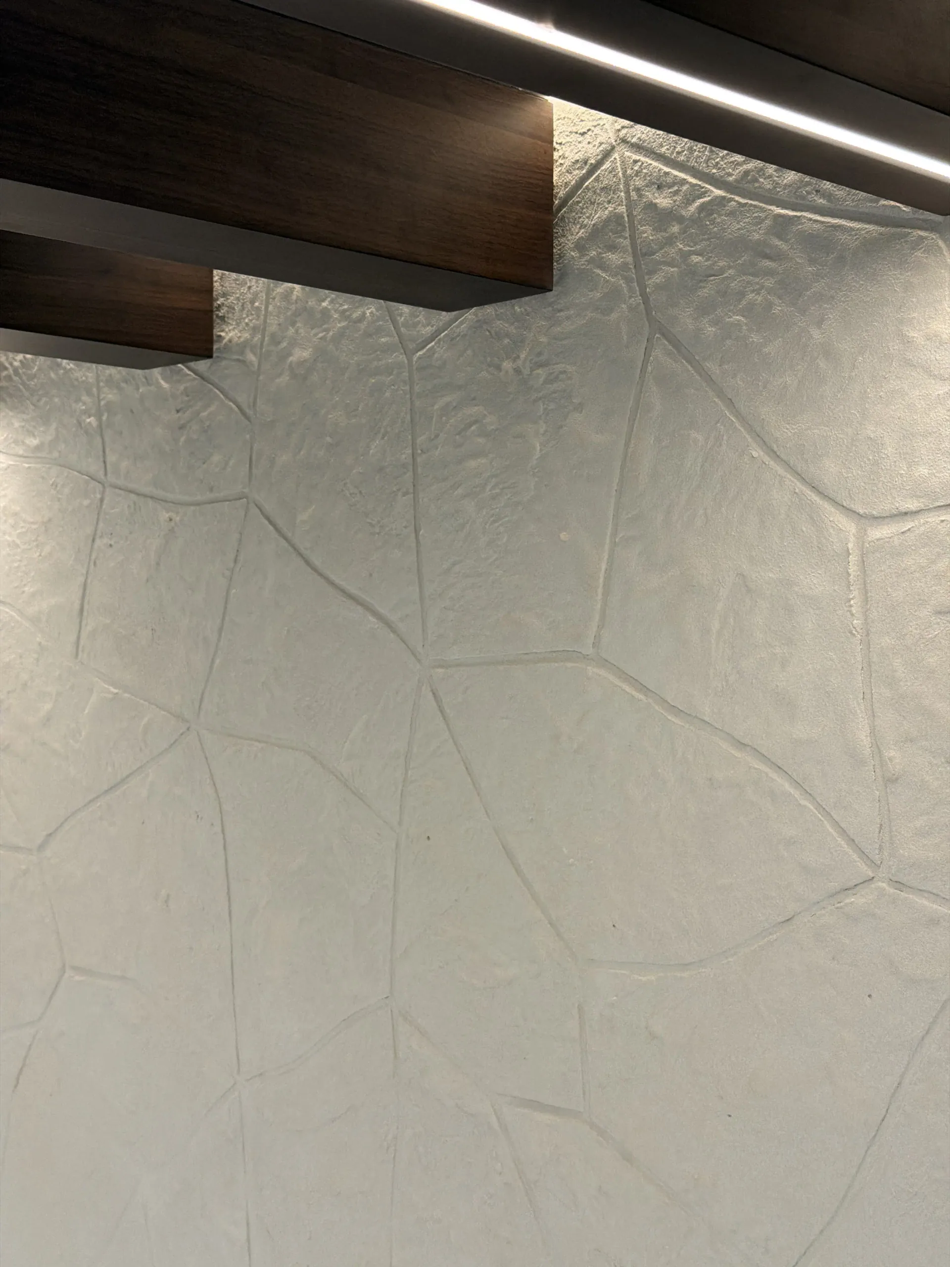A Calm Continuous Surface - Study 14, a microcement overlay residential decorative finish in soft taupe