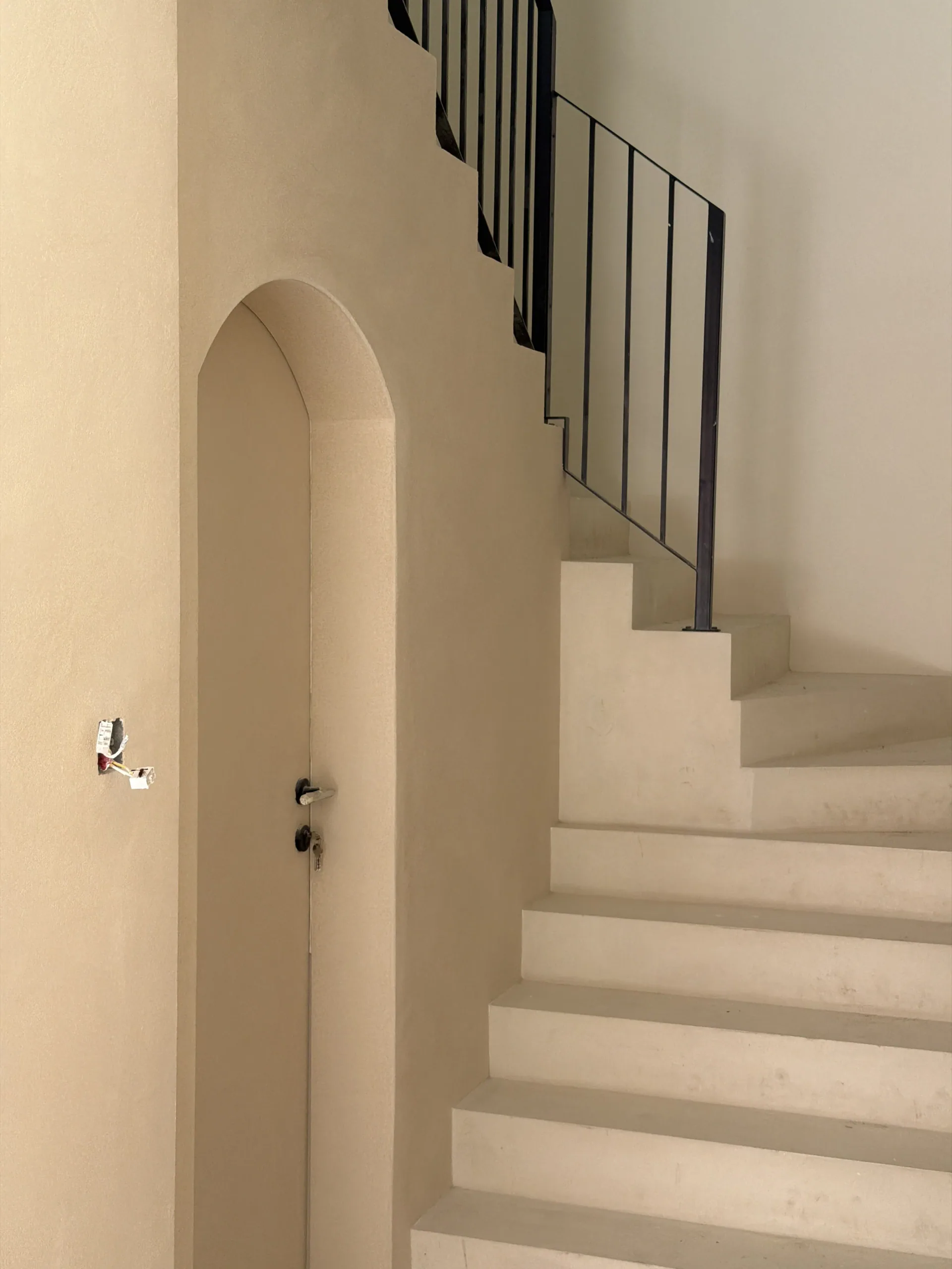 A Calm Continuous Surface - Study 146, a microcement overlay commercial decorative finish in soft taupe